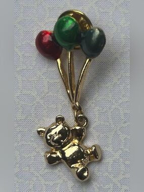 Vintage Carucci Gold Tone Teddy Bear Pin with Red, Green, and Dark Teal Balloons